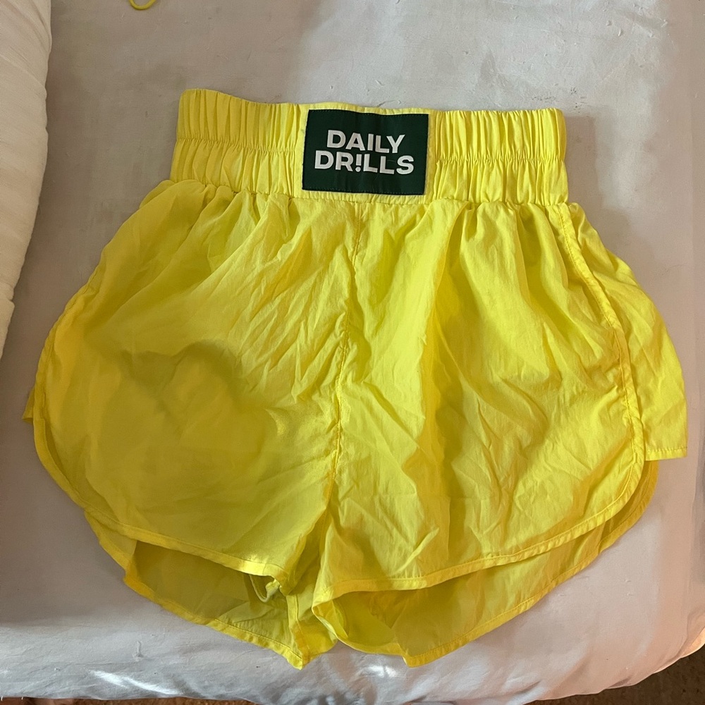 Daily drills yellow nylon workout shorts